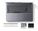 Laptop keyboard on a metal gray chassis with backlit keys and a large touchpad