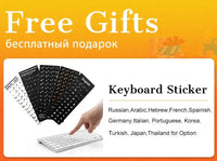 Keyboard Sticker set as free gifts for laptops; shows language sticker sheets in black tones beside a white keyboard.